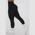Women's black high-waisted seamless yoga leggings with wave texture and lifting effect - S / Bottoms / Black
