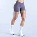 Close-up of seamless yoga shorts featuring a crossover waist and scrunched booty lifting detail - XS / Black Truffle
