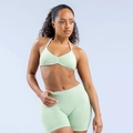 Light green halter sports bra and high-waisted seamless shorts set in matte finish - Palm Green
