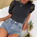 Damen Sommer Jumpsuit in Schwarz mit transparenten Spitzenärmeln und hellblauen Denim Shorts - S / Schwarz