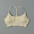 Reggiseno sportivo beige senza cuciture con spalline a Y e fascia sottoseno a coste - Taglia S / Top / Top a Canotta Beige
