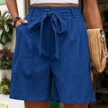 Pantaloncini blu navy a vita alta da donna con fiocco elegante e dettaglio bottone - S / Blu Nebbia