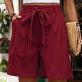 Women's high waist wine red shorts with bow tie belt and pockets in a relaxed summer fit - Burgundy