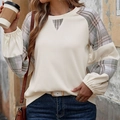 Dettaglio della trama a nido d'ape e delle maniche patchwork a quadri sul top casual - S / Albicocca