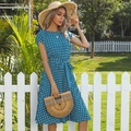 Women's dark blue polka dot pleated summer dress with short flutter sleeves and waist tie - Royal Blue