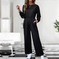 Elegante tuta nera a maniche lunghe con vita elastica e pantaloni a gamba larga donna - S / Nero
