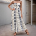Bohemian strapless jumpsuit met blauwe ruitjesprint en een decoratieve strik aan de voorkant - S / Blauw