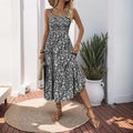 Women's sleeveless floral summer dress in black with shirred bodice and tiered hem - Black