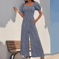 Navy blue floral print romper with square neck and puff sleeves in a wide-leg cut - S / Blue