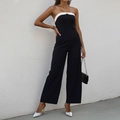 Tuta senza spalline chic bianca e nera con bordo ondulato e gamba larga - XL / Nero