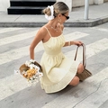 Französisches Vintage Sommerkleid in Hellgelb mit Plissee-Oberteil und Stufenrock - S / Aprikose