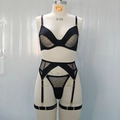 Detail von schwarzem Polka-Dot-Netz-Dessous-Set mit Strapsgürtel und Riemchen - S / Schwarz
