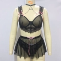 Detail von schwarzem Spitzen-BH mit rosa Schleifen und dazu passendem Netz-Minirock - S / Schwarz