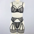 Detail van zwarte mesh lingerieset met stalen ringen, uitsnijdingen en metalen ringen - S / Zwart