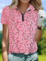 Close-up of pink women's Polo shirt with zipper neckline and colorful golf tee print - S / Tops / Pink