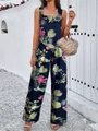 Detail of dark blue jumpsuit with pink floral print and tropical leaves on wide straps - XL / Top And Bottom / Black