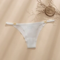 White seamless ice silk thong for women featuring decorative triple gold metal rings - S / White
