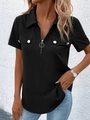 Close-up of black short sleeve shirt featuring a zipper V-neck and decorative button pockets - S / Tops / Black