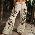 Gedetailleerd borduursel van rode bloemen op beige linnen broek met elastische taille - Wit