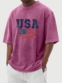 Détail du tissu en coton violet délavé et de l'imprimé drapeau USA sur le t-shirt homme - S / Hauts / Rose