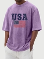 Detail of vintage washed purple t-shirt featuring USA flag print and oversized fit - Purple
