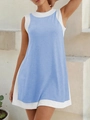 Detail view of sleeveless blue and white patchwork dress with soft fabric texture - Sky Blue