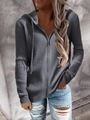 Detail of dark grey hooded cardigan featuring ribbed knit texture and front metal zipper - S / Tops / Blue Gray