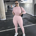 Set sportivo due pezzi rosa da donna con crop top a maniche lunghe e leggings attillati - Taglia S / Top E Pantaloni / Rosa