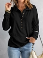 Dames zwarte gebreide poloshirt met wafelstructuur en knoopsluiting bij de reverskraag - S / Tops / Zwart