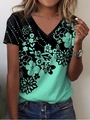 Women V-neck short sleeve T-shirt with floral print and black mint green contrast - S / Light Green
