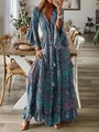 Detail of bohemian floral maxi dress featuring bell sleeves and tassel V-neckline print - S / Blue