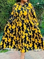 Elegante vestido largo de manga larga con estampado geométrico amarillo y negro y corte en A - 1XL / Amarillo