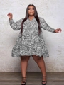 Detail of V-neck plus size dress with black and white geometric print and ruffled hem - 3XL / Geometric Print