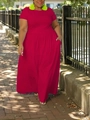 Detail of high-waist pleated hem on magenta plus size maxi dress with ankle length - Red