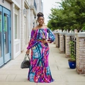 Women's two-piece set featuring off-shoulder tie-dye crop top and matching maxi fish skirt - Purple