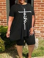 Detail of the faith cross print on a loose black cotton t-shirt with cycling shorts - 3XL / Black