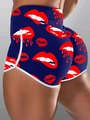 Detail der Sporthose mit hoher Taille, rotem Lippenprint und weißen Kontrastpaspeln - 2XL / Blau