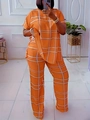 Detail of orange checkered two-piece set featuring short sleeve top and wide leg pants - Orange