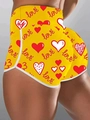 Detail der gelben Fitness-Shorts mit hoher Taille, Herzprint und weißer Einfassung - 3XL / Gelb