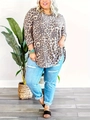 Detail view of plus size leopard print long sleeve top with distressed denim jeans - XL / Gray