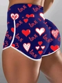 Detail of high waisted compression shorts with red heart and love prints on navy fabric - Navy Blue