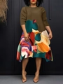 Women's plus size midi dress featuring olive green bodice and vibrant abstract print skirt - Dark Brown