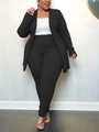 Detail showing high-stretch fabric texture on black cardigan and white base top - Black