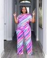 Detail of colorful striped two-piece set featuring off-shoulder top and wide-leg pants - Rainbow Diagonal Stripes
