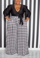 Détail du pantalon large à taille haute avec motif pied-de-poule noir et blanc classique - 1XL / Noir