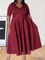 Detail of elegant wine red V-neck plus size dress with a high waist and flared skirt hem - 1XL / Burgundy