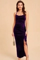 Detail of deep purple velvet evening dress featuring ruching and a high side slit - Purple