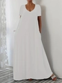 Detailed close-up showing the elegant V-neckline and soft fabric of the white maxi dress - 1XL / White
