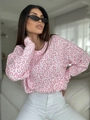 Detail of pink leopard print pattern and ribbed cuffs on a long sleeve casual sweatshirt - S / Tops