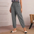 Close-up of dark grey cotton linen pants featuring an elastic waist and large side pockets - S / Gray